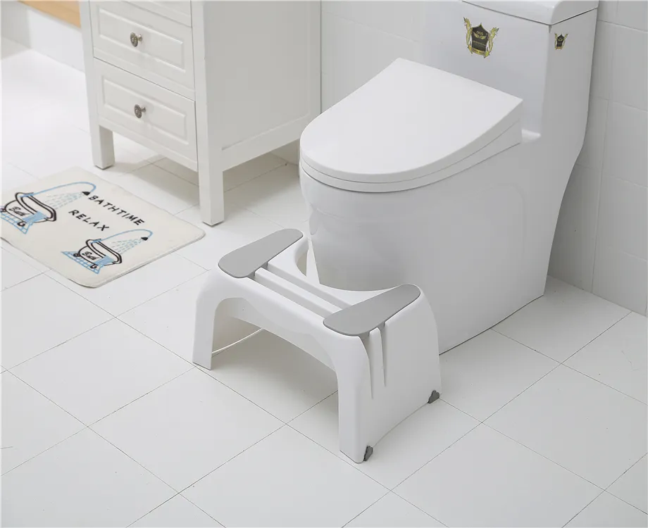 white plastic squat potty toilet stool for children or adult