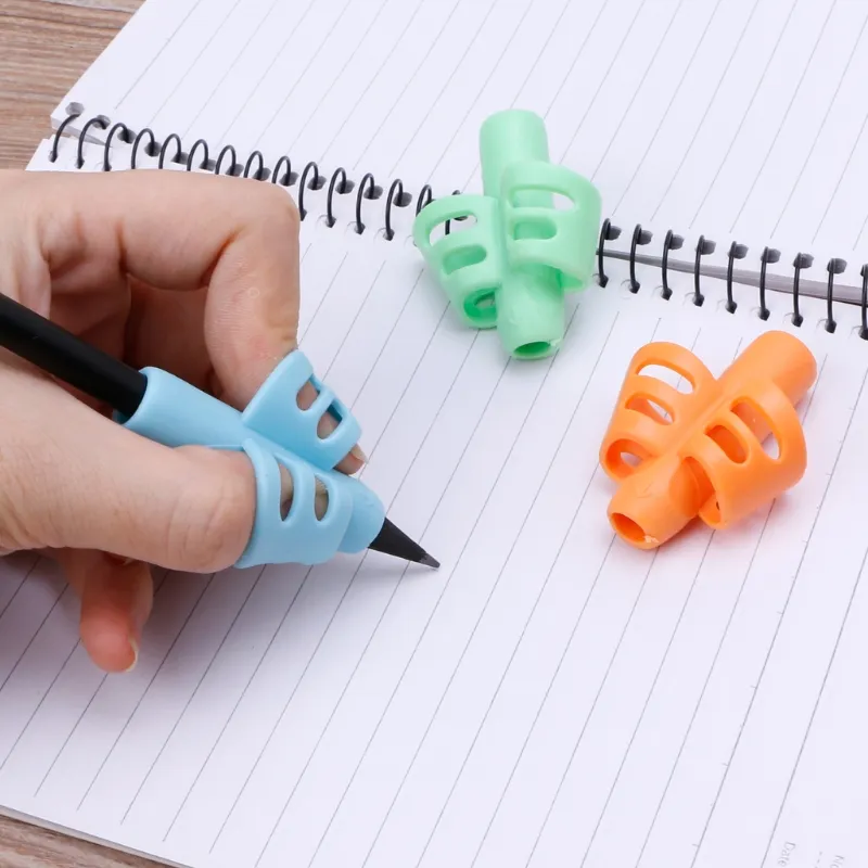 New Children Pencil Grips Writing Aid Posture Correction Tool Multi Colors Writing Claw for Children Pencil Grips