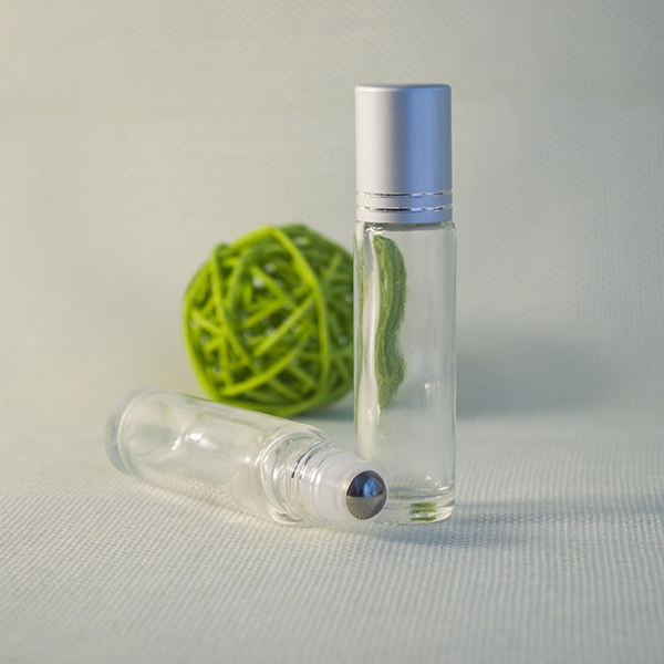 empty mini refillable glass roll on bottle with stainless steel roller ball for eye cream and essential oils
