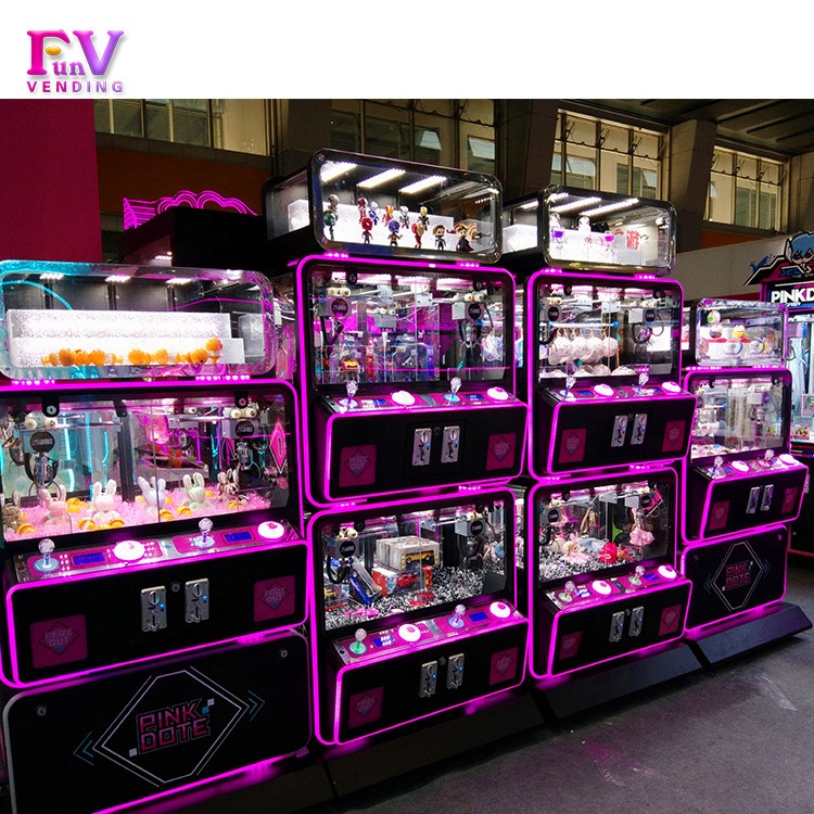 Coin Operate game small toy claw machine 2 palyers toy crane claw machine for sale malaysia