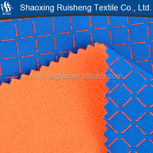 softshell of stretch fabric bonded TPU film bonded fleece with punching skills