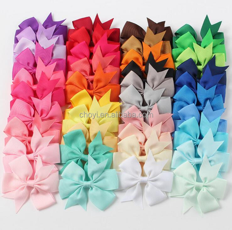 Solid color ribbon fishtail bowknot stock hair bow satin custom logo ribbon bowknot design