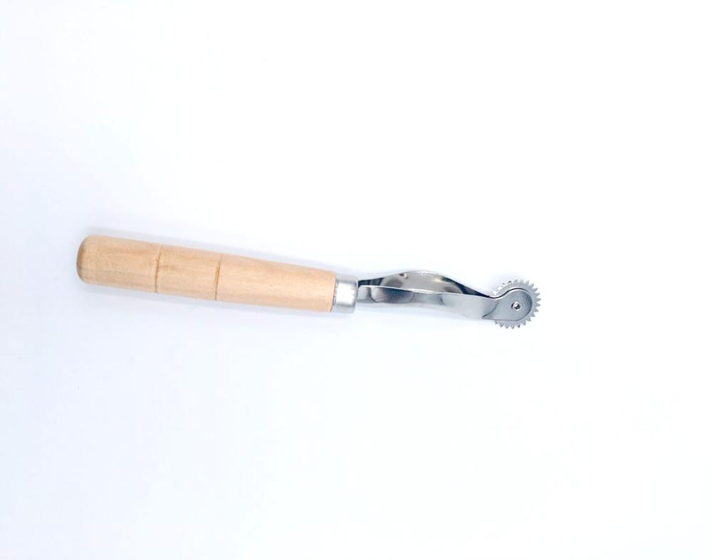 Factory direct selling wooden handle all-steel toothed wire pressing wheel