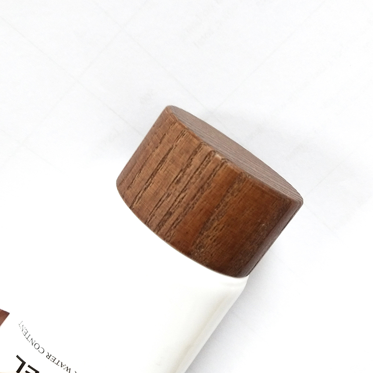 Plastic white cosmetic cream PE packaging tube with wood cap 200ml