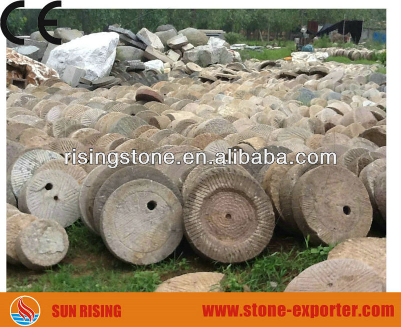 antique granite millstone
