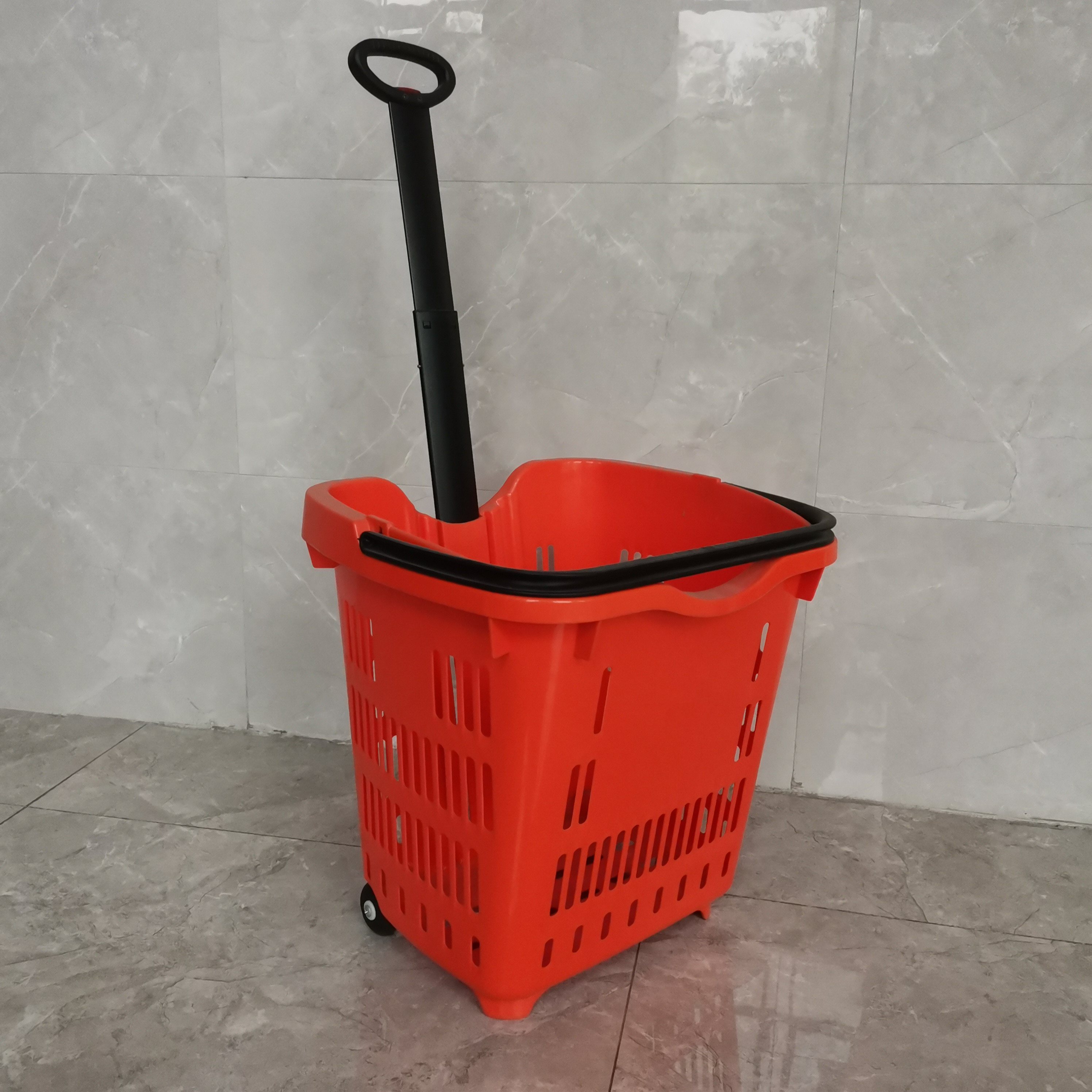 Rolling plastic shopping basket for supermarket
