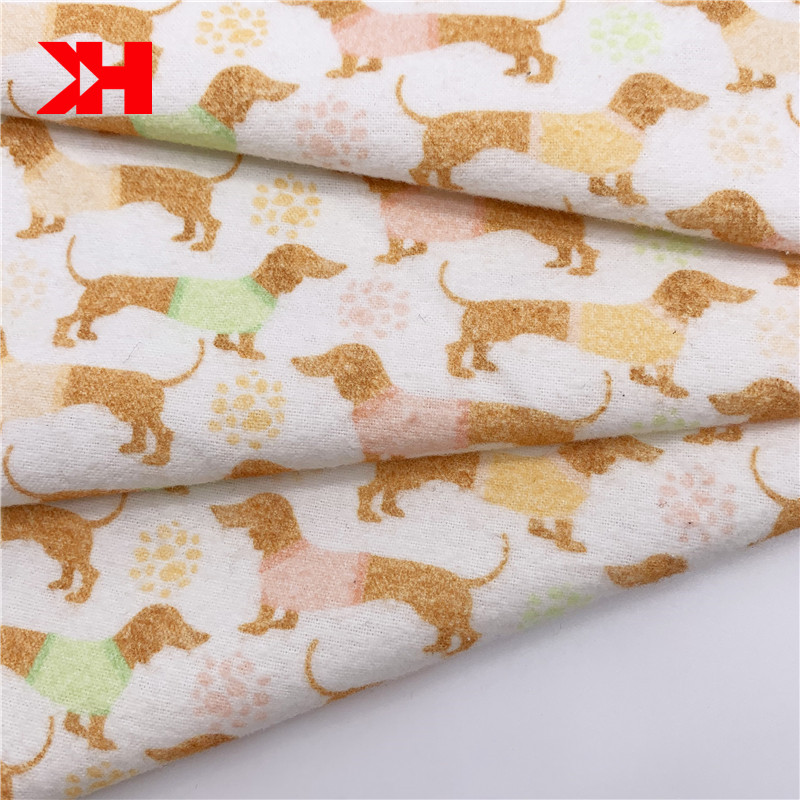 Kahn low MOQ 21S*21S 165gsm 150cm cartoon organic cotton woven flannel fabric print custom dog baby flannel textile roll stock