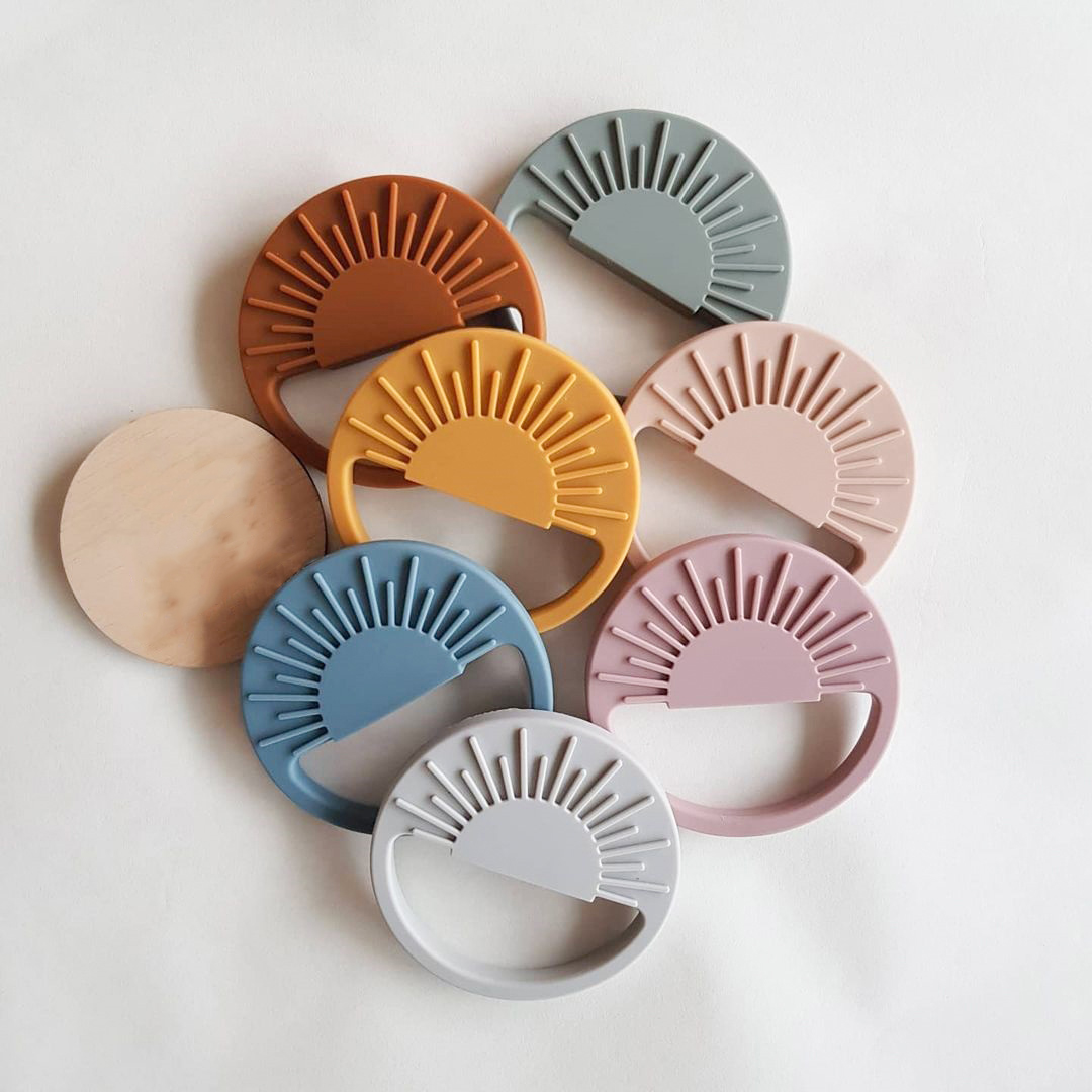 Custom Bpa Free Cute Baby Eating Training Teething Toy Gift Children Silicone Chewable Ring Round Sun Toys Silicone Baby Teether