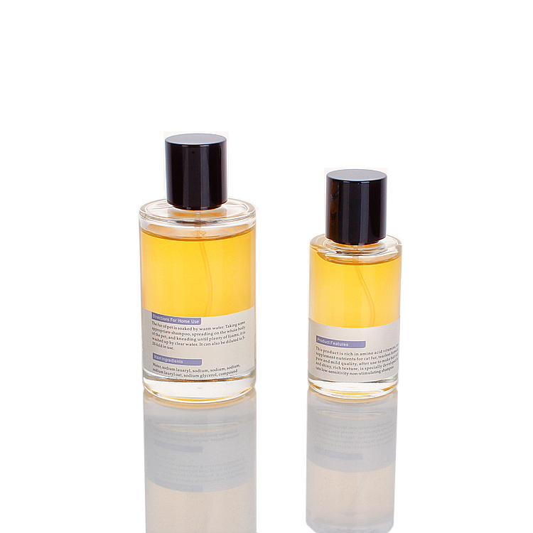 China Custom 50ml 100ml Cylinder Shape Empty Spray Luxury Perfume Bottle with black cap