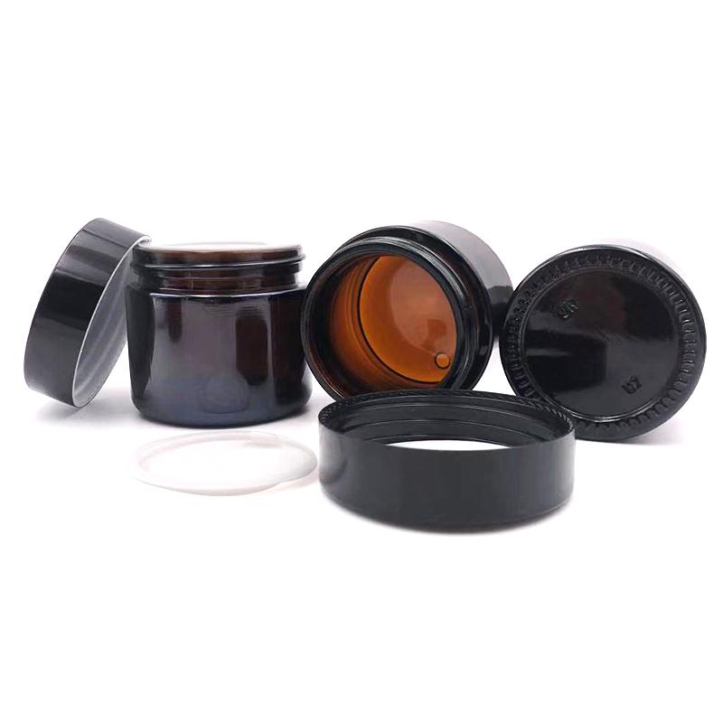 Wholesale 5ml 10ml 15ml 20ml 30ml 50ml 100ml wide mouth cosmetic jar round amber glass candle jar with flat plastic cap