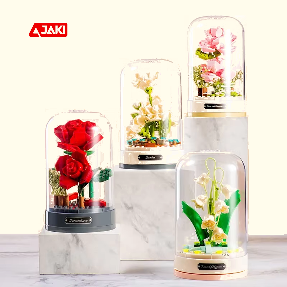 JAKI New Building Blocks Eternal Flower Rotating Music Box plastic Building Block Brick toy for Children