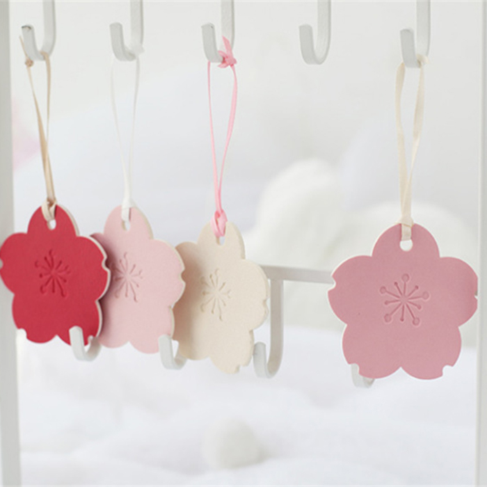 custom debossed logo cute petals pu bookmark with card packaging
