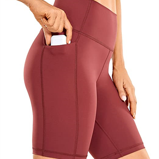 Wholesale Seamless waistband and flatlock Women Naked Feeling Biker Shorts with Pockets Women's Yoga Shorts Fitness Running