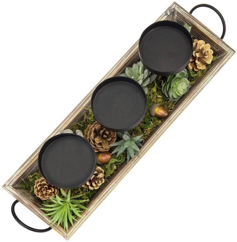 christmas pine cone decoration 3 metal candlesticks with burning wooden tray and artificial succulent