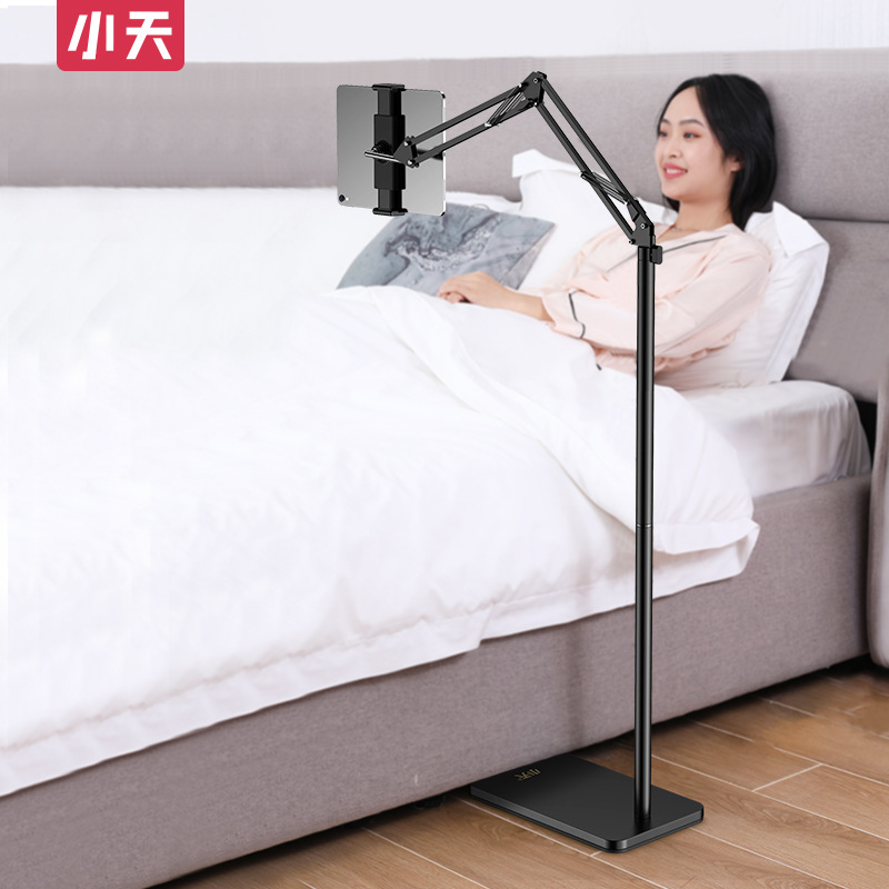 A floor-to-ceiling phone stand at the head of a bed Cantilever bracket for domestic use tablet PC stand