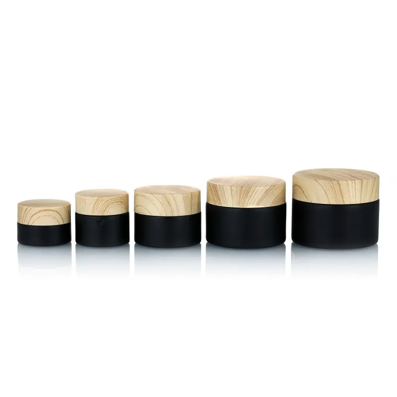 Wholesale cream container matte black frost glass jar with bamboo wood grain lid 5g 10g 15g 20g 30g 50g glass cosmetic jars