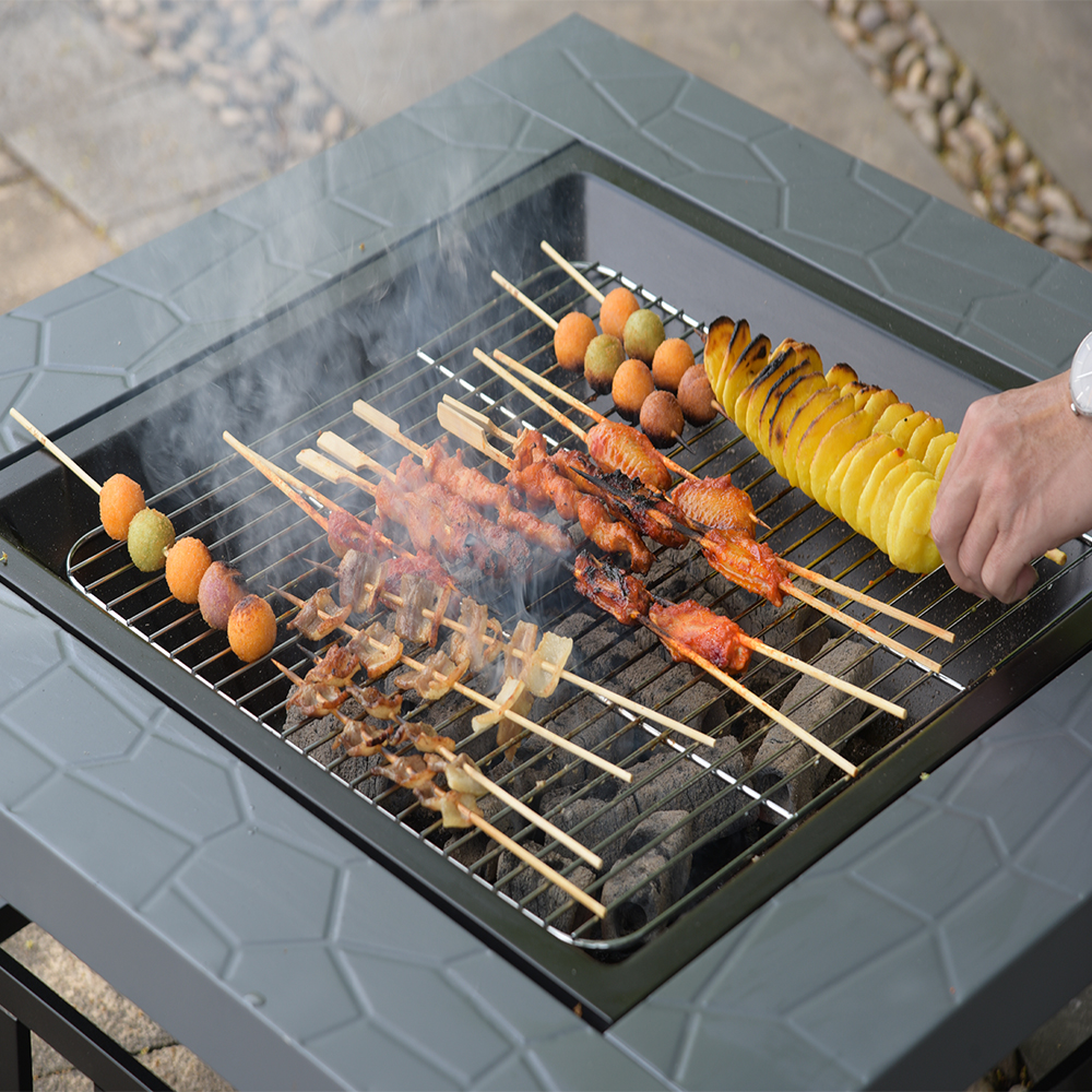 Wood burning cast iron stove with oven camp out charcoal grills in backyard