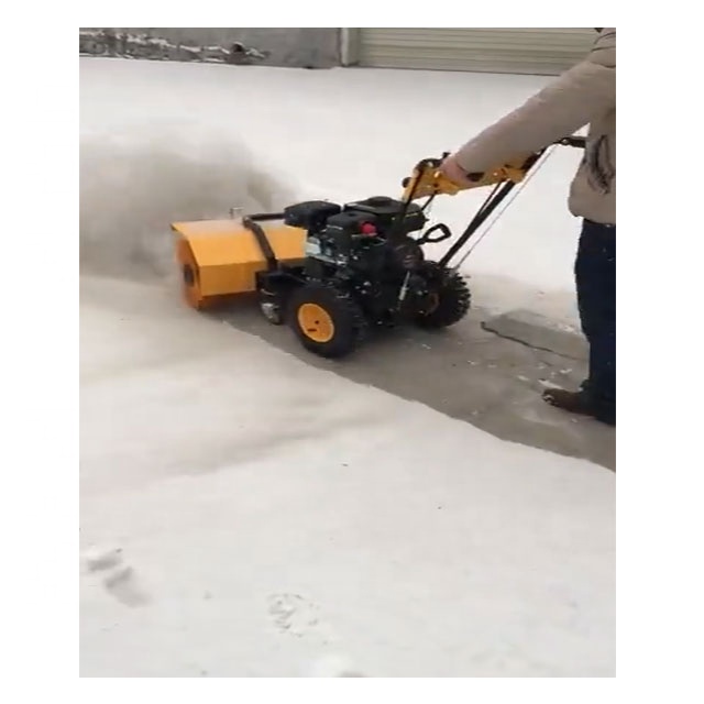 Residential property snow clearing implement Brush snow sweeping facility High-powered snow thrower