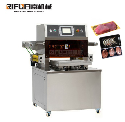 Semi-automatic multifunctional salmon vacuum skin packaging machine