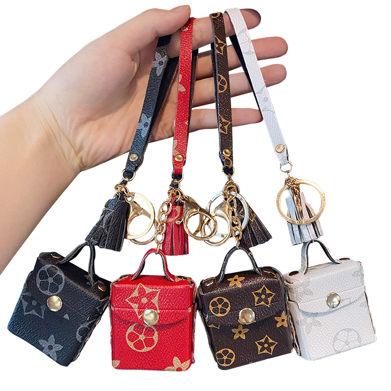 New wholesale leather zero wallet leather key chain cute pendant headphone bag portable leather bag key chain