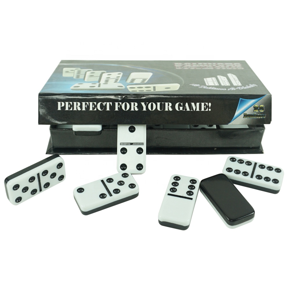 Black and white two-tone dominoes with funny cardboard box