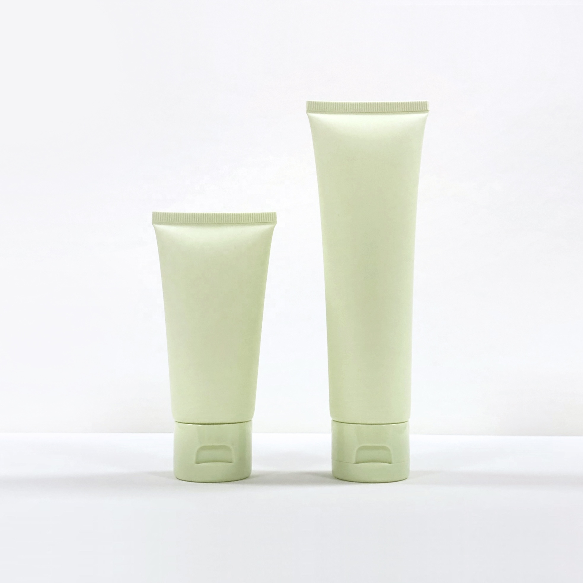 Custom 100g Light Green Matte Plastic Cosmetic Tube for Facial Cleanser and Hand Cream Packaging Stock Product