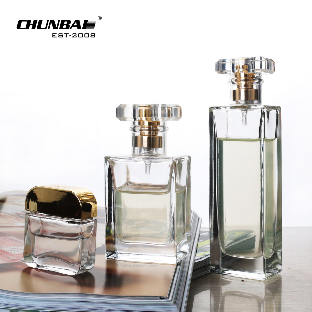 Wholesale Luxury 50 ml 100 ml Round rectangle Glass Perfume Bottle with Screw Cap custom