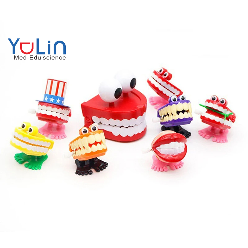 Dental toys jumping teeth children's toys clockwork toys tooth jumping teeth jumping frog kindergarten gifts