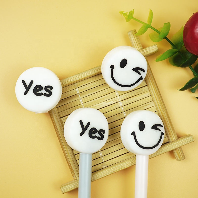 2022 Amazon Hot Selling Trend Silicone Cute Kids Smile Face Cartoon Pencil Head Topper PVC Plastic Pen With Cap