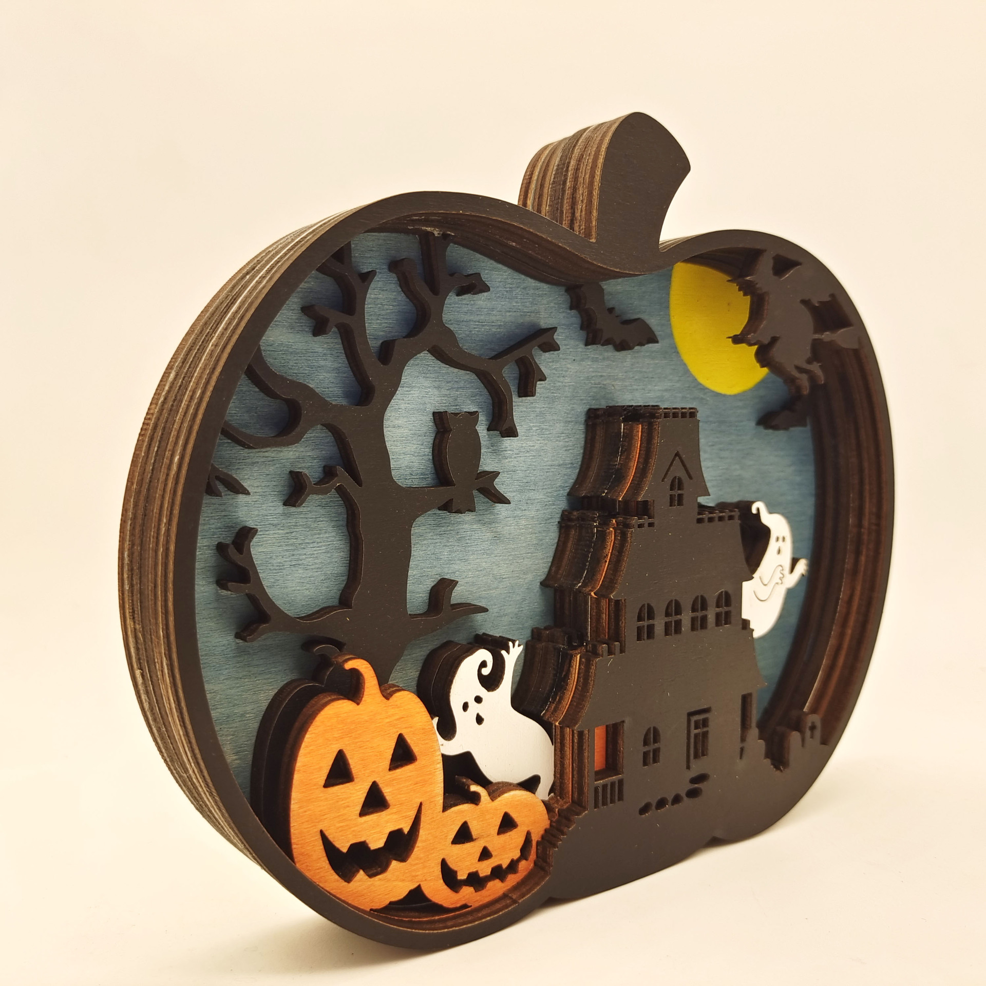 Wooden carved pumpkin decorations for Halloween