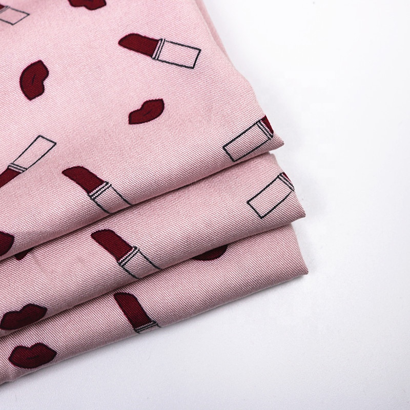 stock in pink lipstick printing fabric 100%rayon material twill printed dress fabrics for lady and children