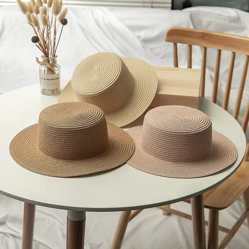 Wholesale lady boater Sun hat Flat top straw beach hat round summer sun panama hat women