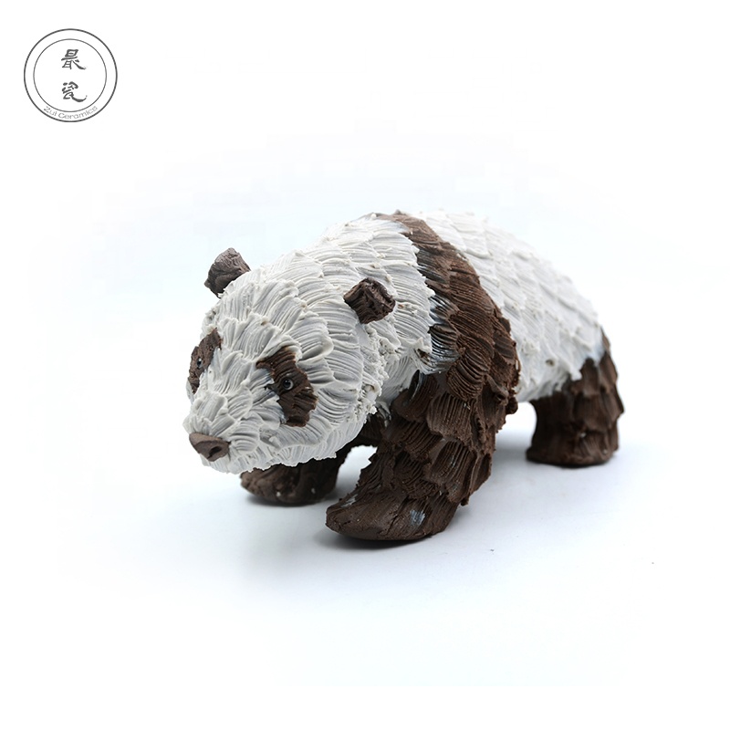 Young ceramic artist handmade handicrafts panda ceramic figurines
