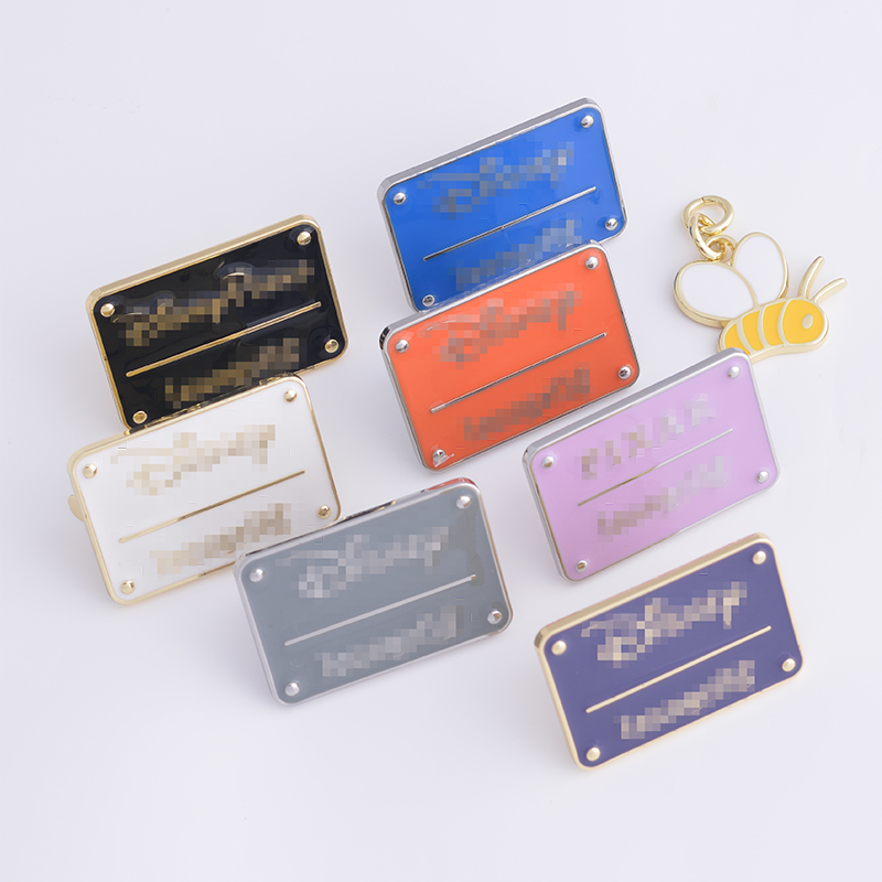 OEM ODM environmentally friendly color glue metal LOGO Tag Custom Engraved Metal Brand Logo Labels For Handbags