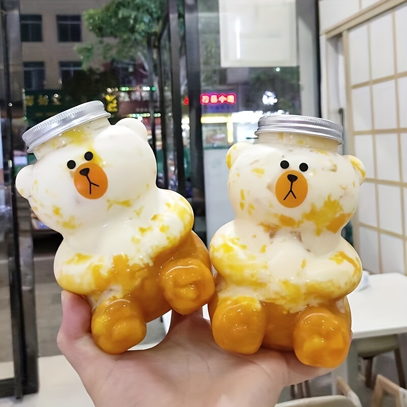 Factory Sell Pet Cartoon Juice Bottle Bear Shape Plastic Juice Bottle Beverage Bottle With Lid