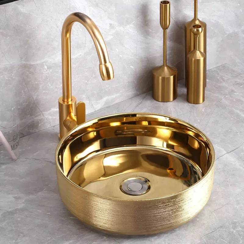 Modern hotel toilet washroom round golden plated ceramic countertop washbasin luxury gold face hand wash basin sink for bathroom