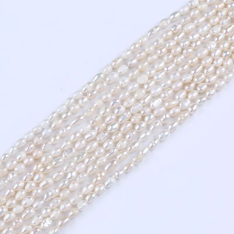 4-5mm white rice shape freshwater pearl strands cheap beads