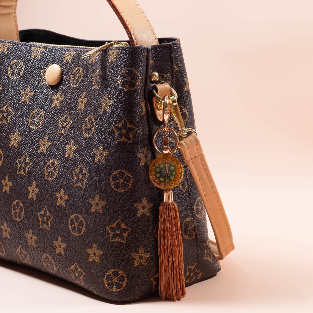 Hot selling on facebook flower pattern colored glazed brown thread tassel key chains bag decoration