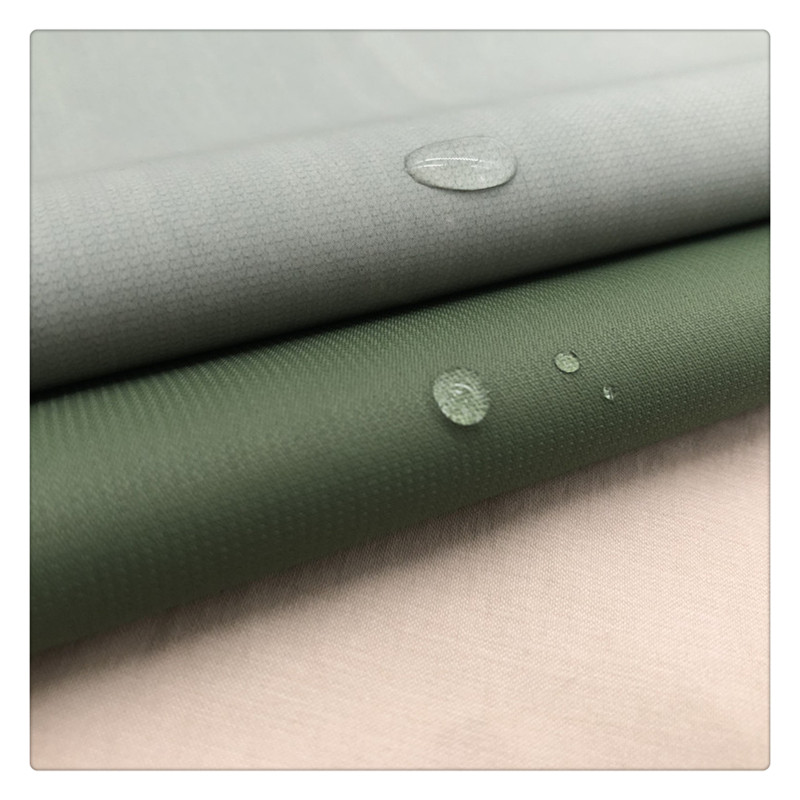 Hot selling 100%poly wholesale striped pongee fabric waterproof raincoat wear fabric for umbrella