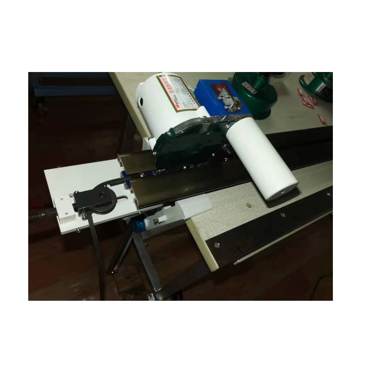 Electric control fabric end cutter blades for cutting fabric