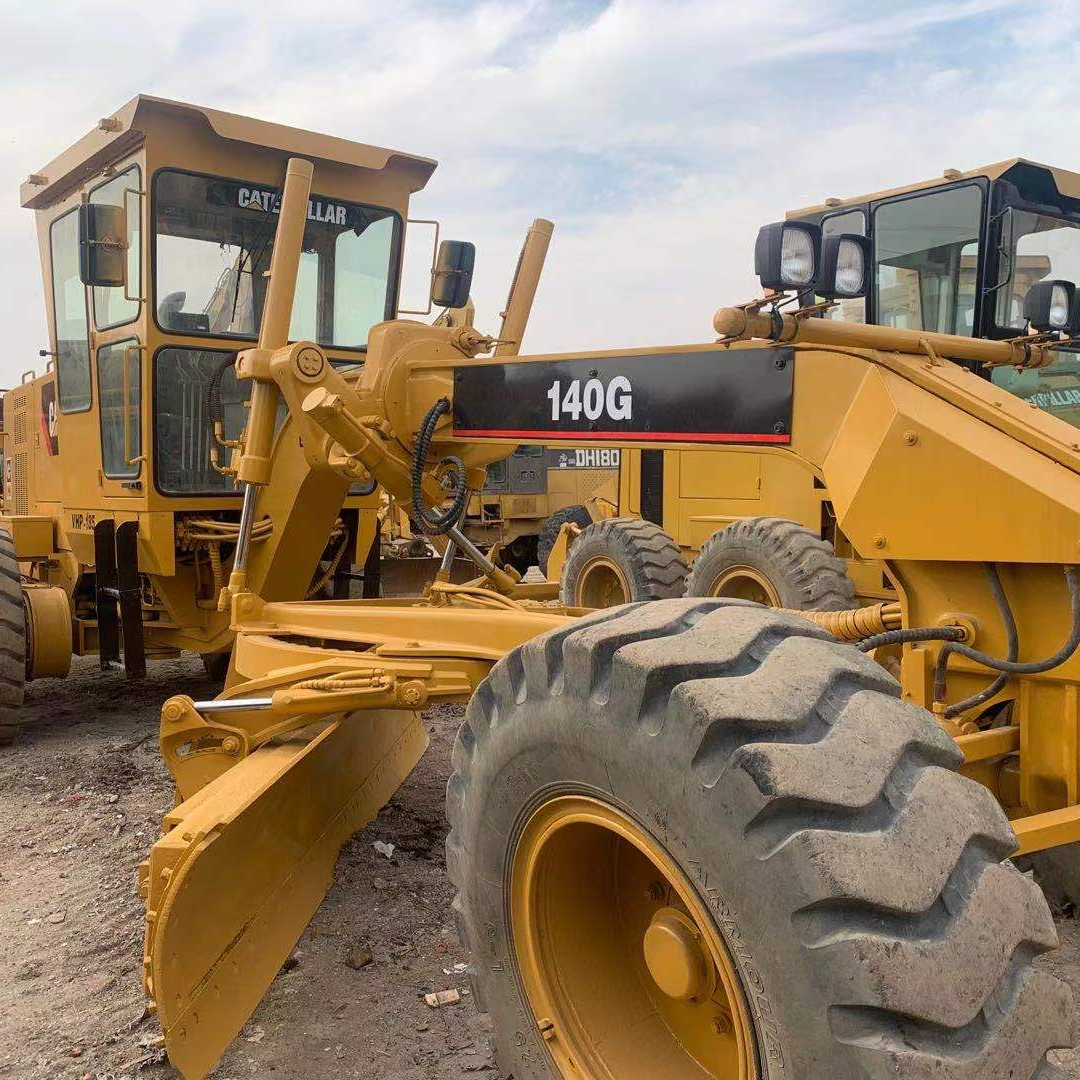 Японский автогрейдер CAT 140h б/у грейдер 140 г в хорошем состоянии