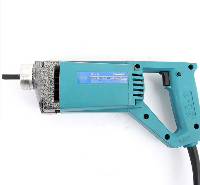 Hand-held plug-in concrete vibrator