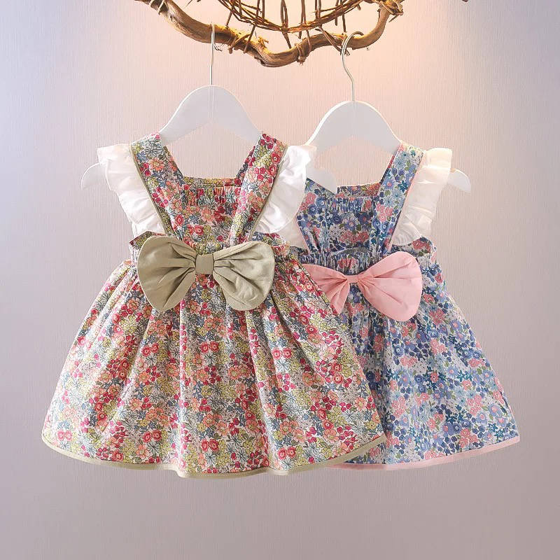 Ins2022 summer new girl baby flying sleeve dress princess dress children's chest bow dress broken flowers