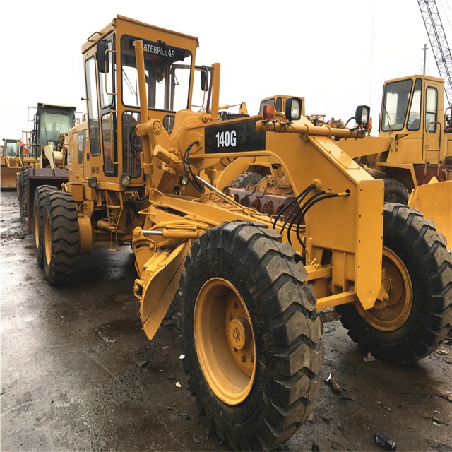 Оригинальный б/у автогрейдер Caterpillar 140 г