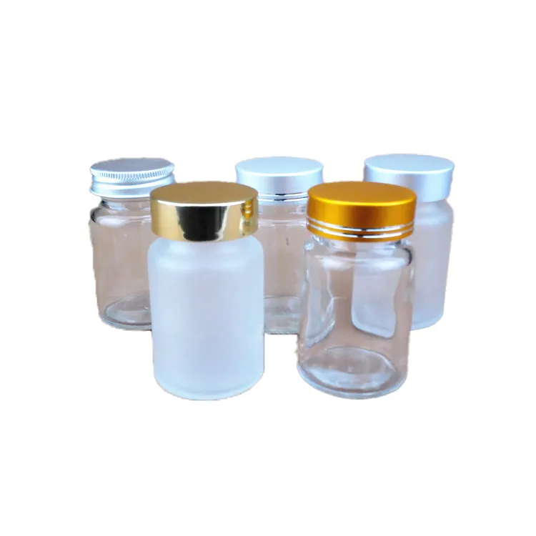 60ml Shiny Gold Matte Silver Cap Clear Glass Medicine Bottle Frosted Glass Capsule Bottle With Aluminum Screw Lid