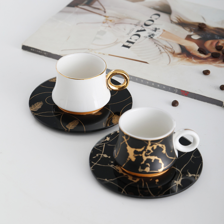 Graceful cambered black gold decorative designer cups glass saucer set luxurious tea ceramic coffee cup for gift