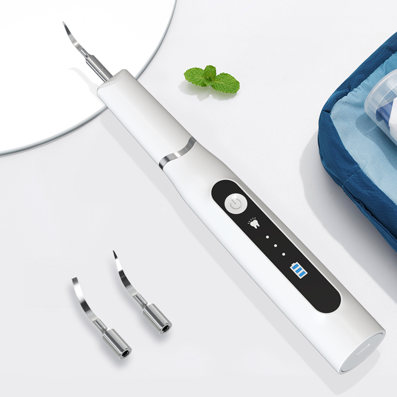 Rechargeable Home Dental Ultrasonic Tooth Cleaner is used to remove calculus