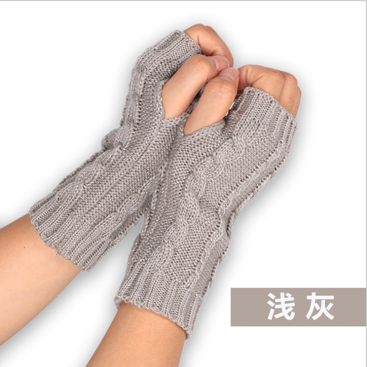 Students writing and playing computer woolen knitted warm gloves in autumn and winter
