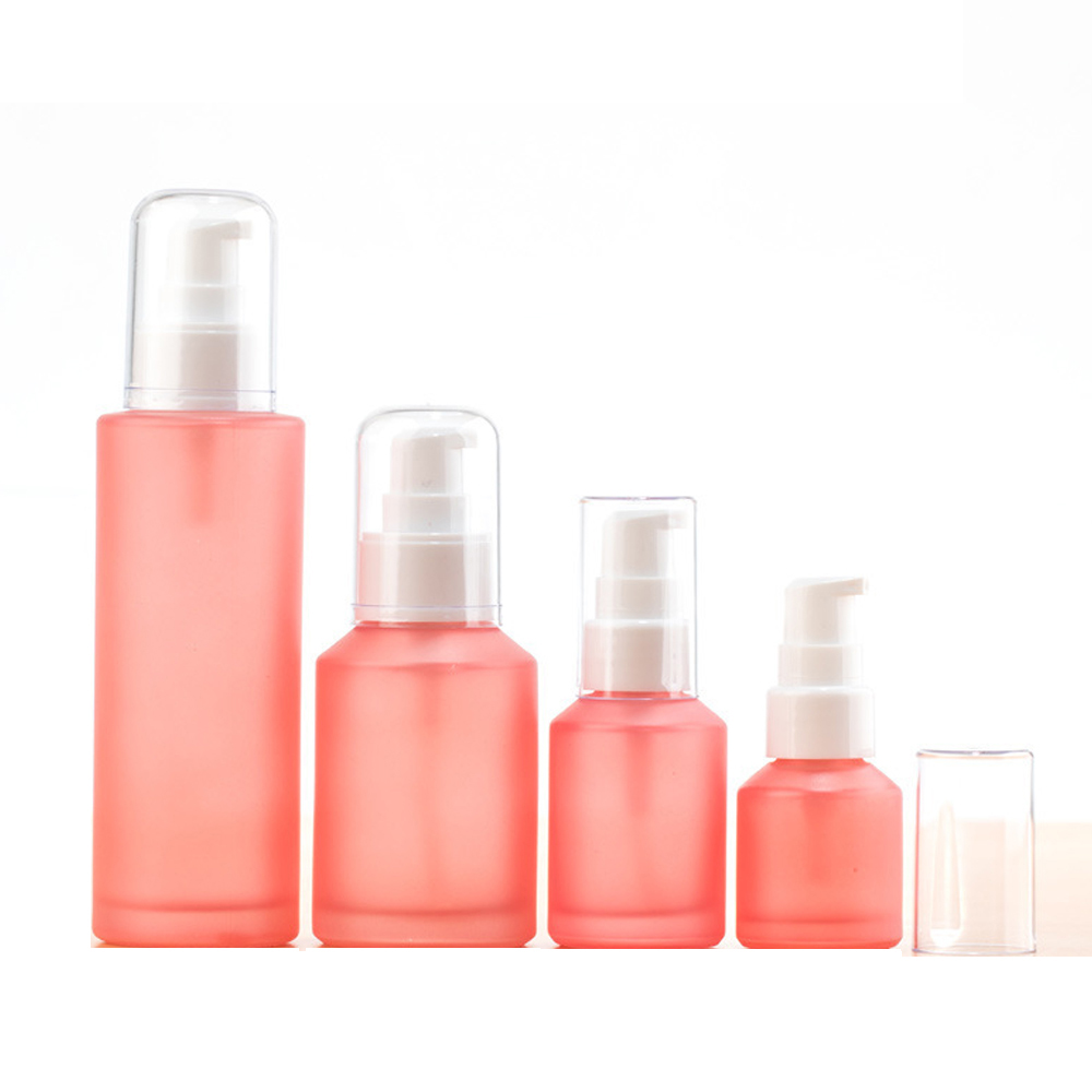 Wholesale frosted pink glass cosmetic pump bottle 15ml 30ml 60ml 100ml toner bottle lotion bottle with long nozzle pump