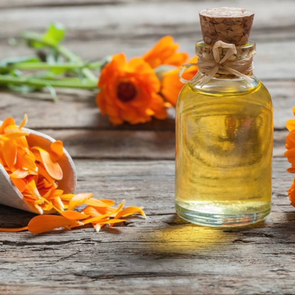 Wholesale 100% Pure Calendula Oil Packaging Size 25 Kg Bulk Wholesaler in India for Therapeutic Skin Care Use at Best Prices